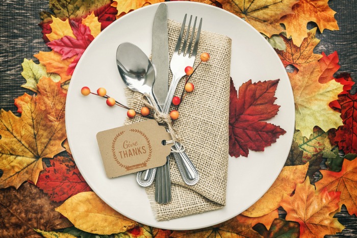 Thanksgiving tablescape plate with a card reading "Give thanks."