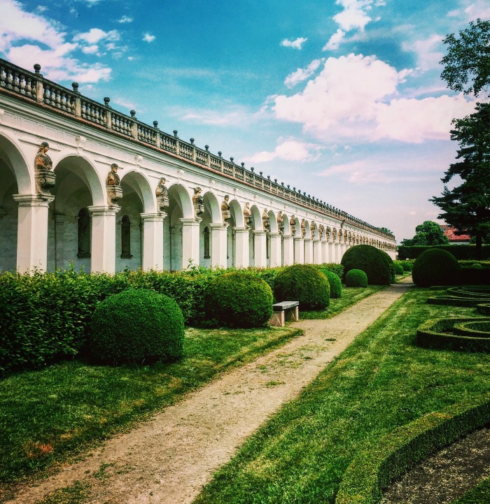 Gardens near a Roman architecture styled colonade