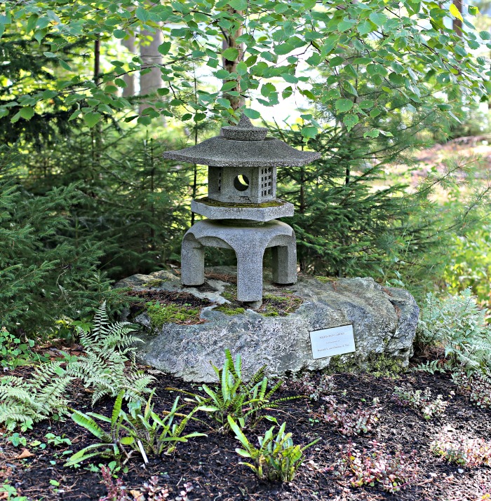 A zen stature in the meditation garden at Boothbay Botanic Gardens