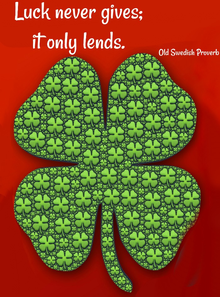 Shamrock covered in smaller shamrocks on a red background with Old Swedish Proverb about Luck