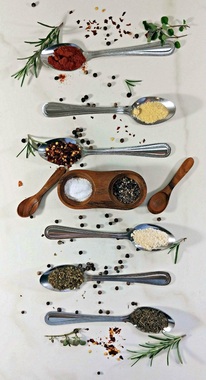 Spoons and spices for a spicy rub