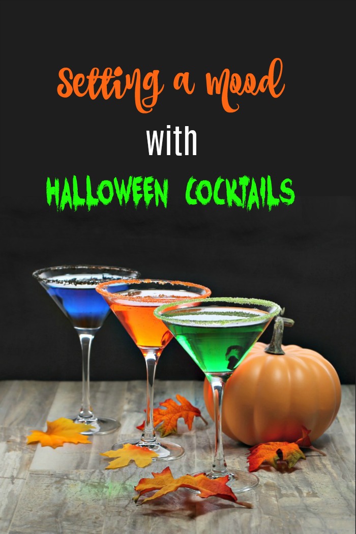 3 Colorful drinks with text reading "setting a mood with Halloween Cocktails"