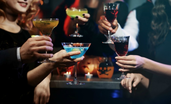 Party guests with colorful drinks
