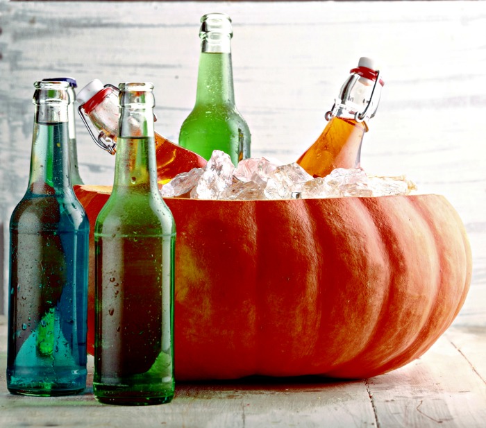 Halloween cocktail special effects - Using a pumpkin filled with ice as an ice bucket.