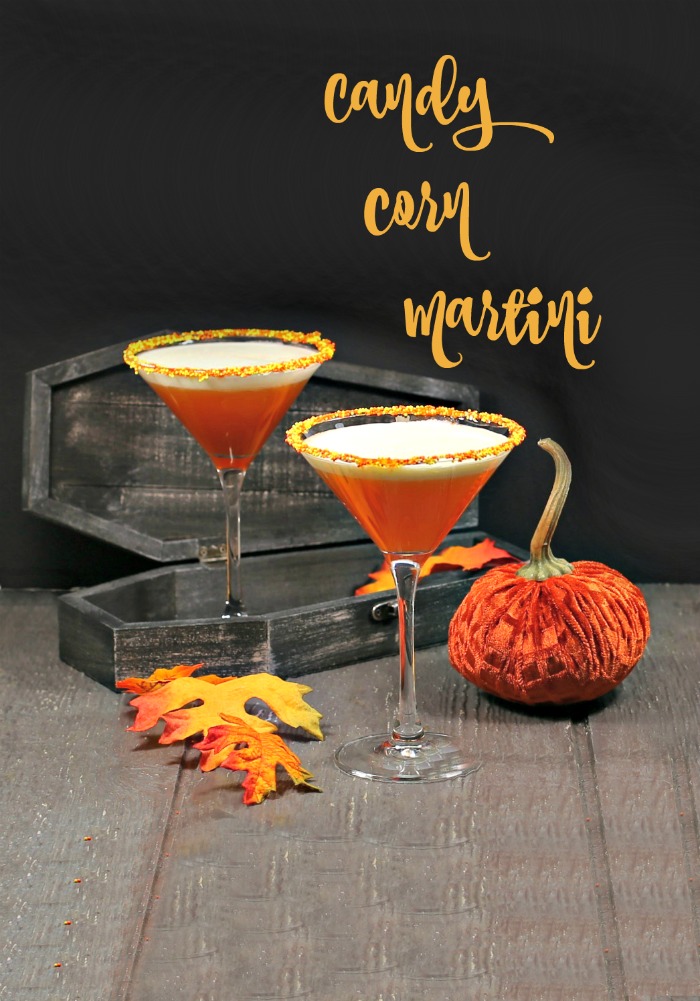 Two layered drinks with a coffin and candle and text reading "candy corn martini."