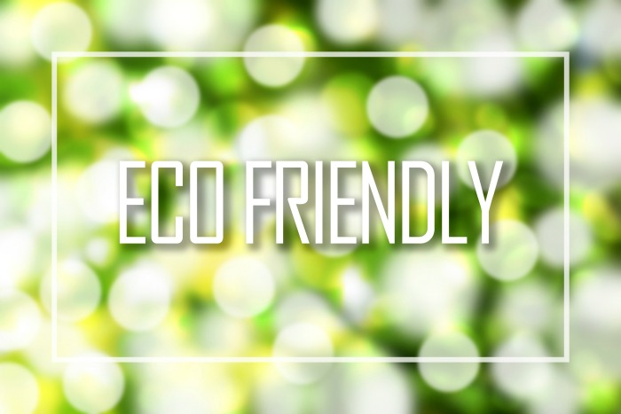 Eco-friendly text on green bokeh.