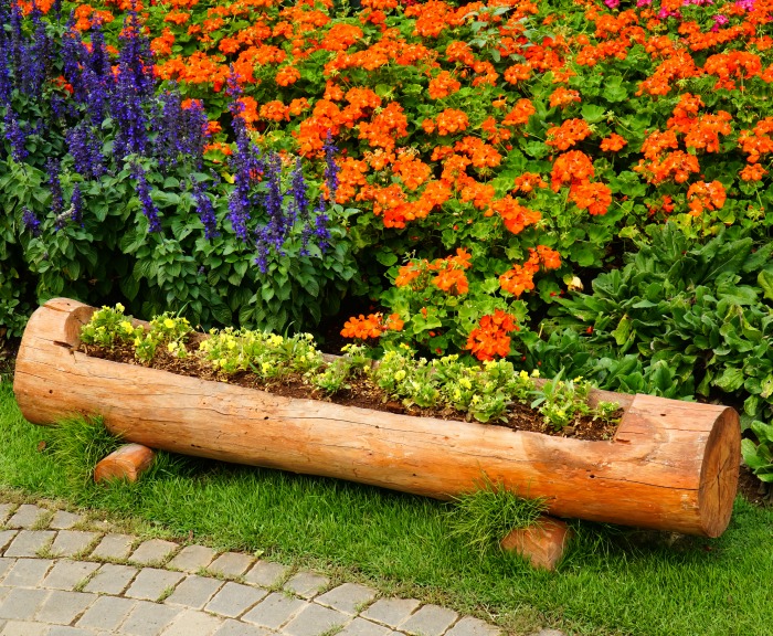 Long log planter with feet.