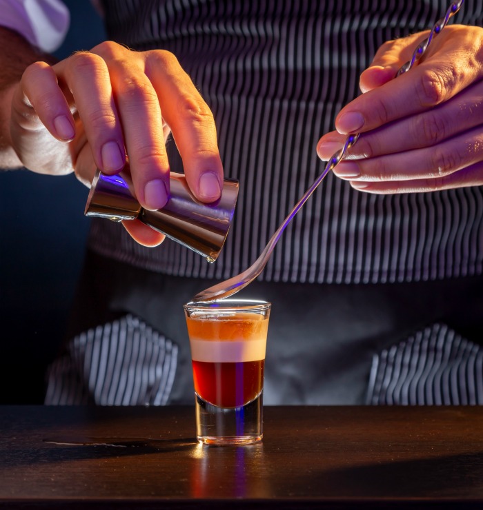 making layers with vodka.