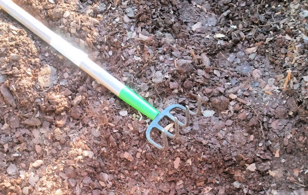 Long hand till and loose soil.