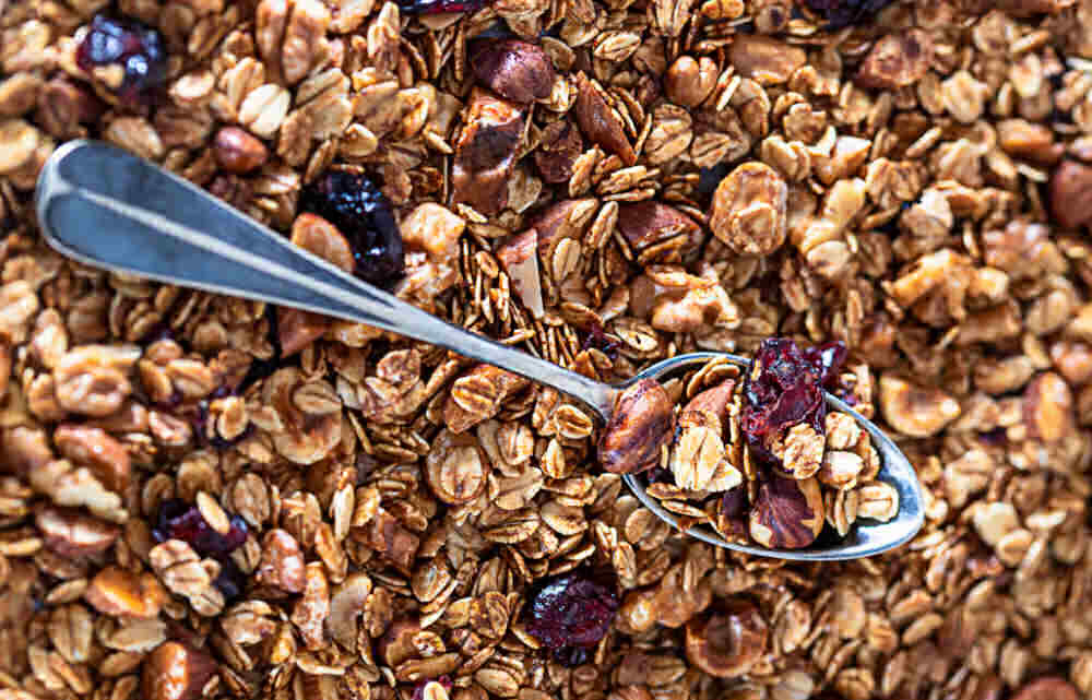 Handmade granola with a spoon.