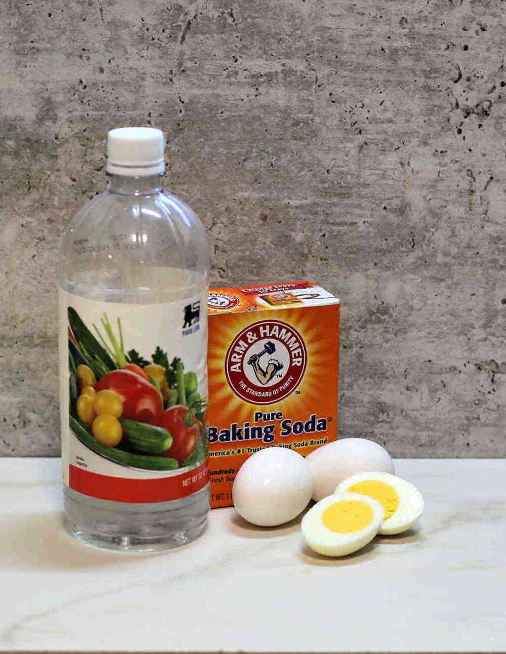 Vinegar, baking soda, eggs, hard boiled egg slices.