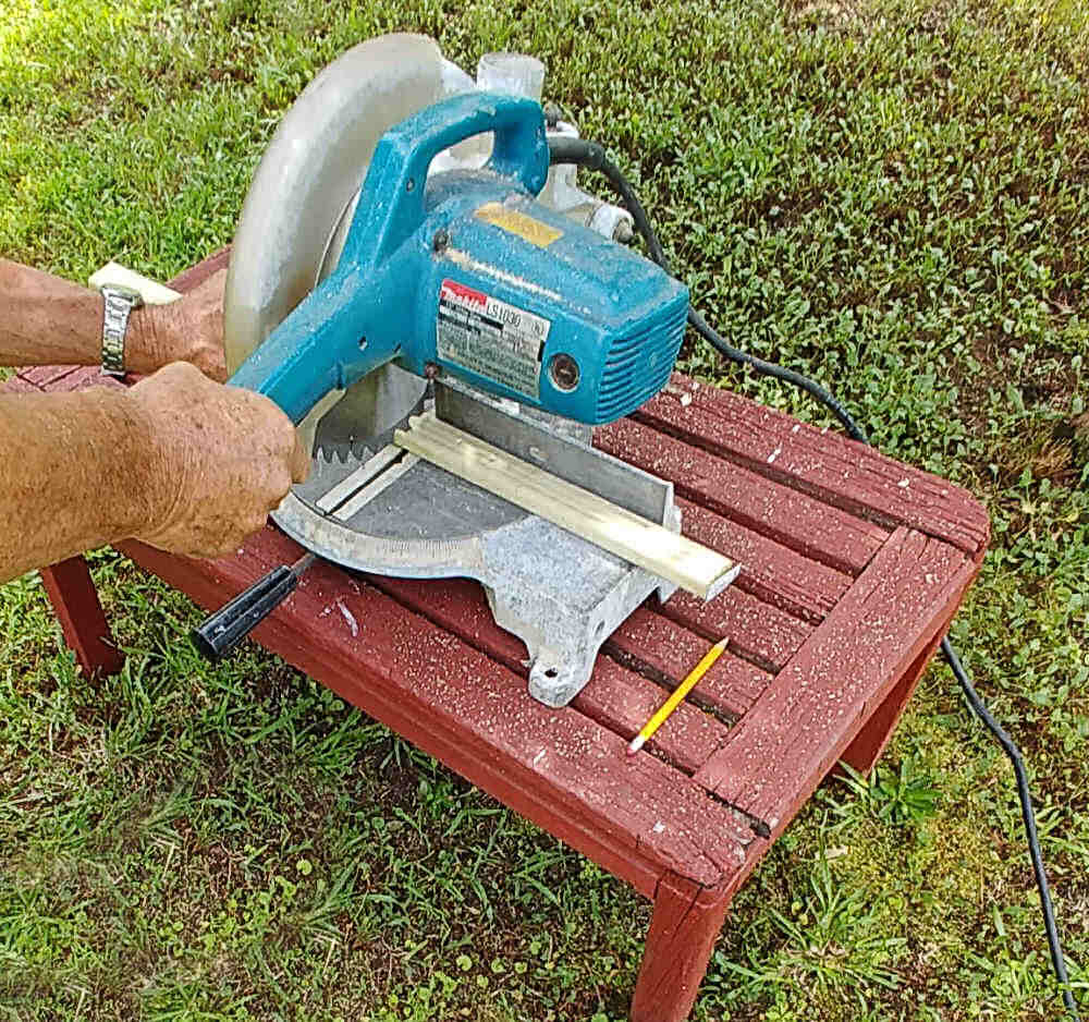 Cutting pieces of wood with a circular saw.